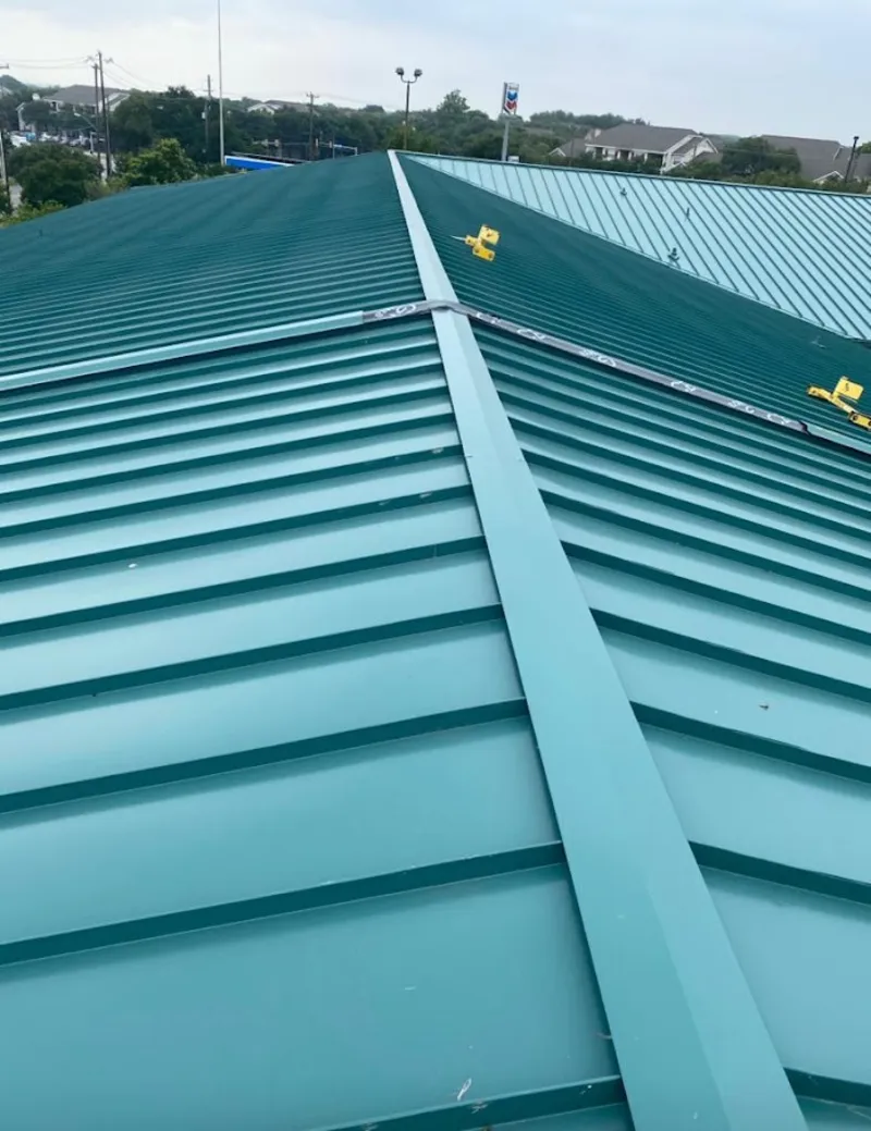 Green commercial metal roof ridge and valley for Metal Roof Repair in Upper Leacock